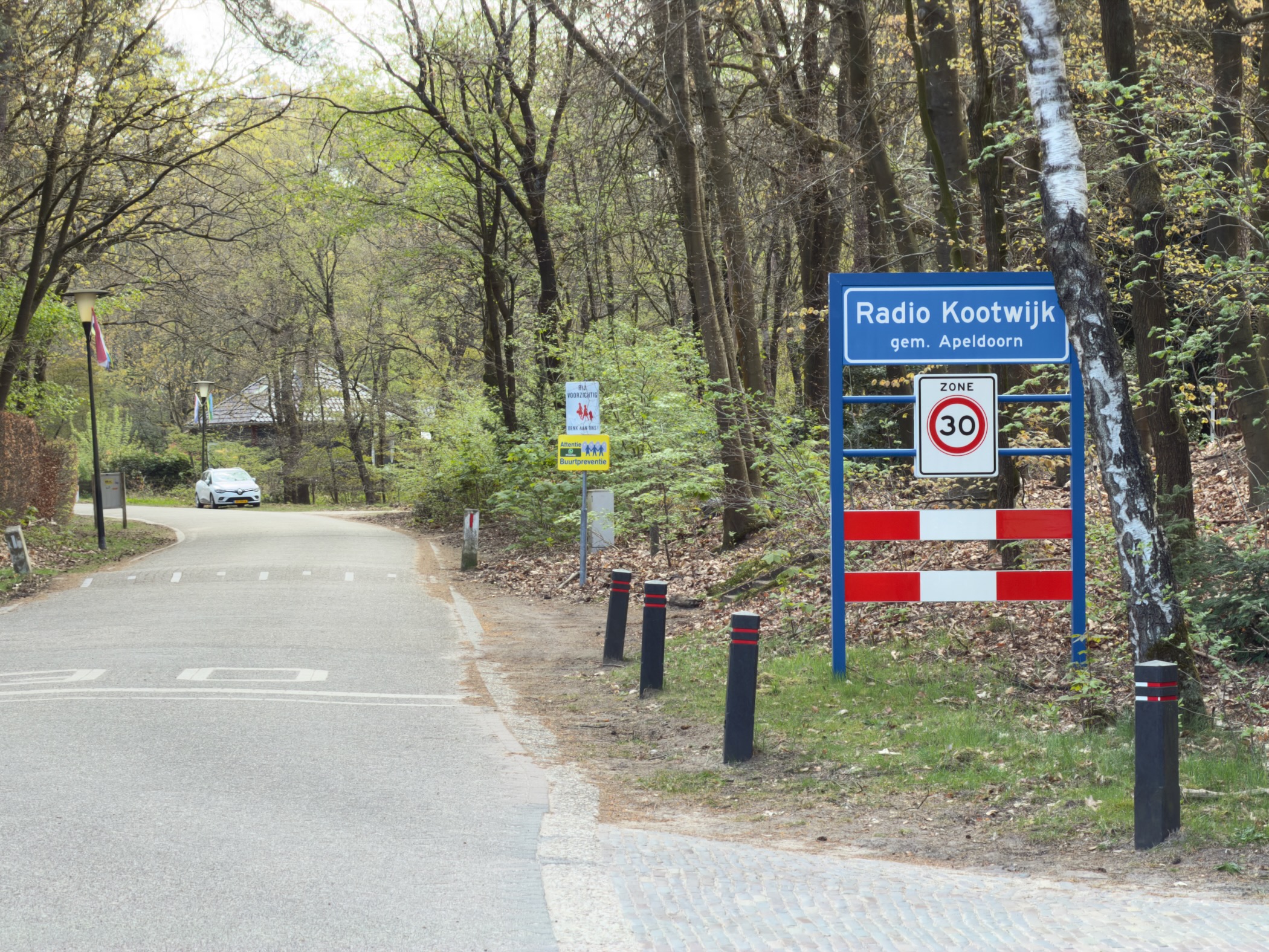 Road sign marking the entrance to the village of Radio Kootwijk